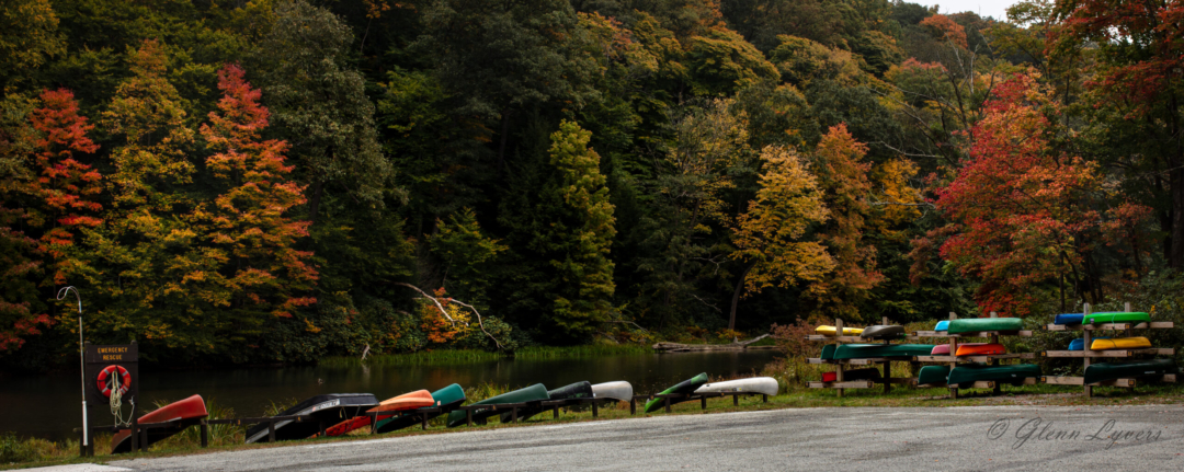 Canoes of many colors showcase an equally colorful array of autumn leaves at Laurel Hill State Park in Somerset, PA.