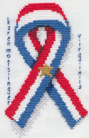 Cross-stitched memorial square by Karen Motsinger